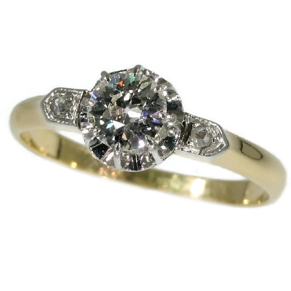 Two tone gold vintage engagement ring with old miner cut diamond